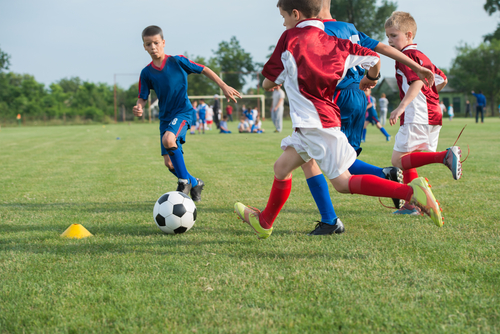 9 ways to help your child excel at a sport at a young age